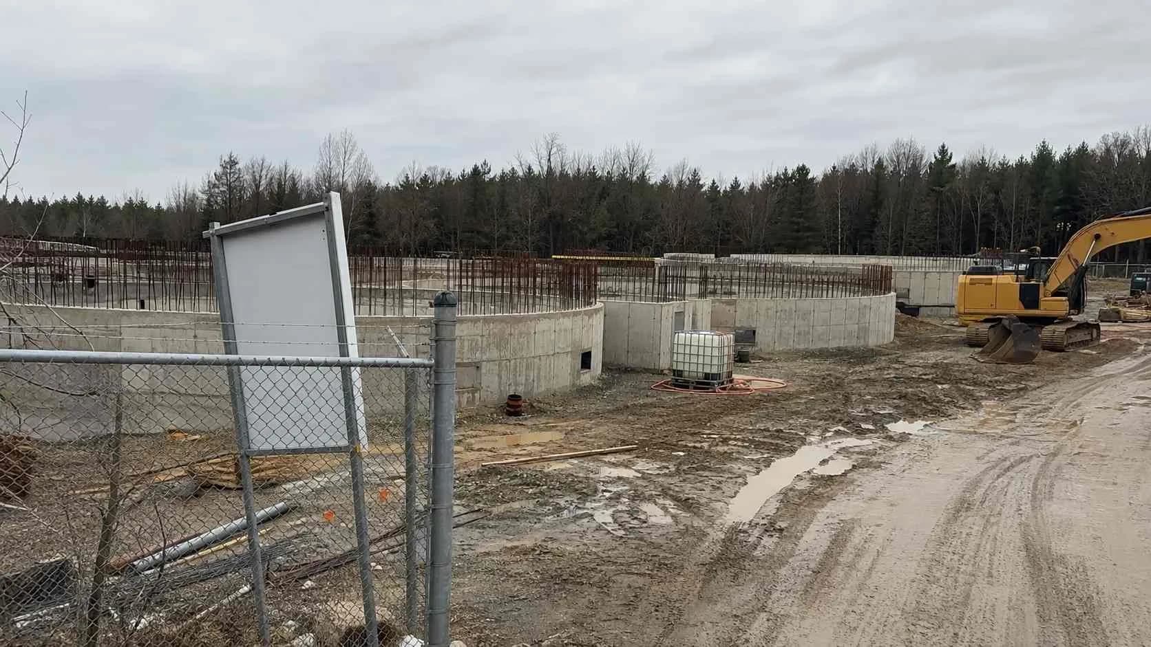 A partially built wastewater treatment plant mid-construction