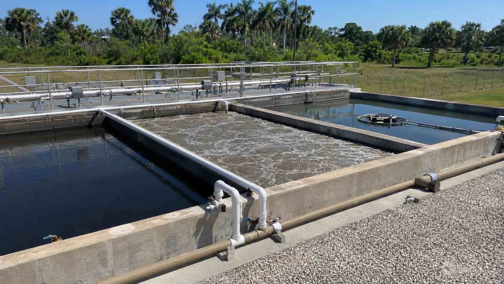 Biological nutrient removal tanks with distinct process zones