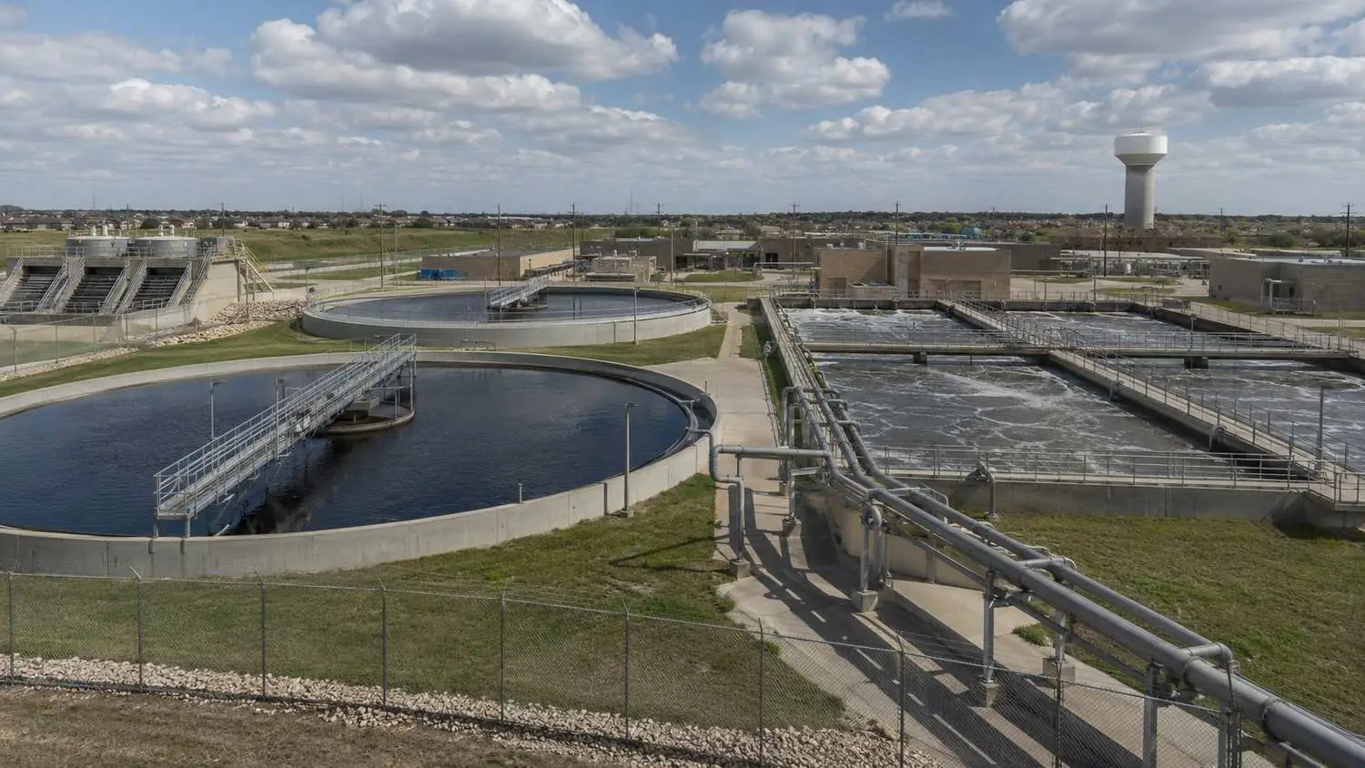 Municipal wastewater treatment plant receiving industrial discharge in Dallas area, representing MES pretreatment coordination.