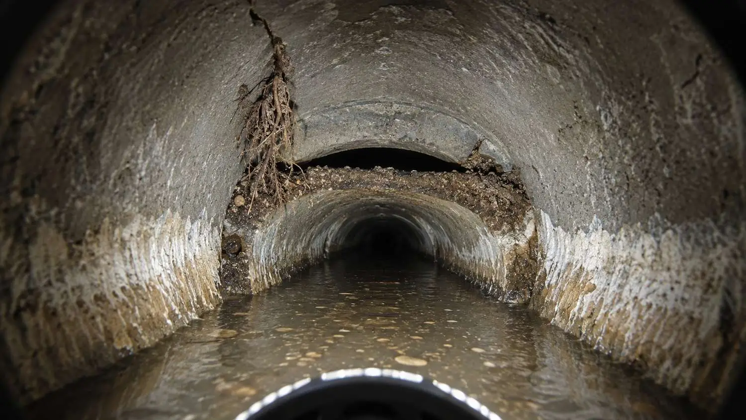 CCTV inspection of a deteriorated Florida coastal gravity sewer showing pipe joint failures and exfiltration defects identified by Modern Engineering Solutions condition assessment.