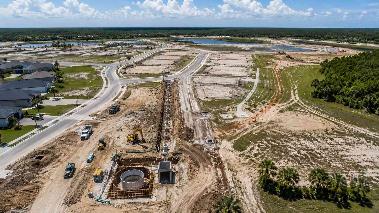 Aerial view of a Florida residential development with wastewater collection system and treatment facility under FDEP permitting evaluated by MES.