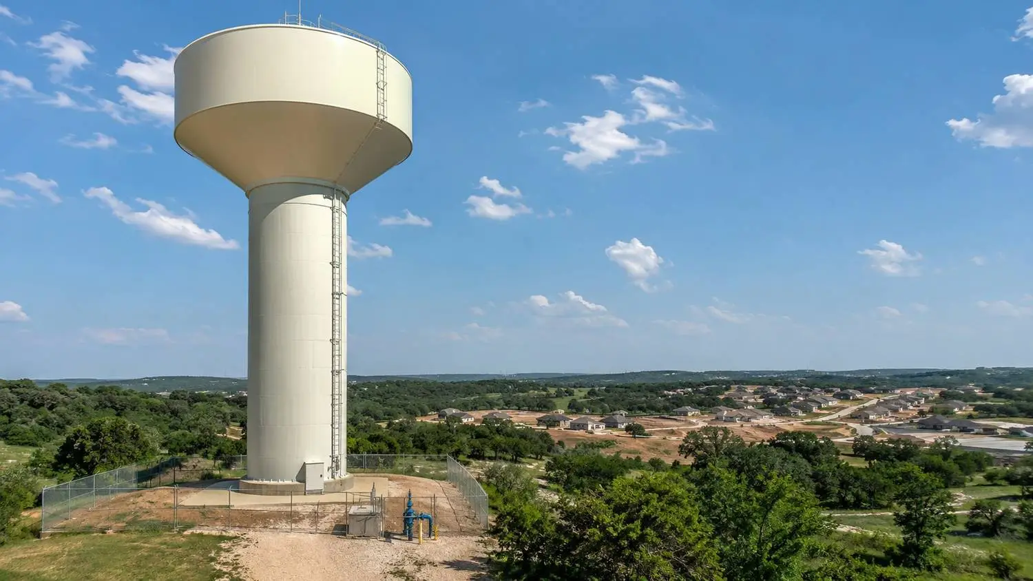 Elevated water storage tank serving Tarrant County growth corridor, representing MES pressure zone evaluation services.