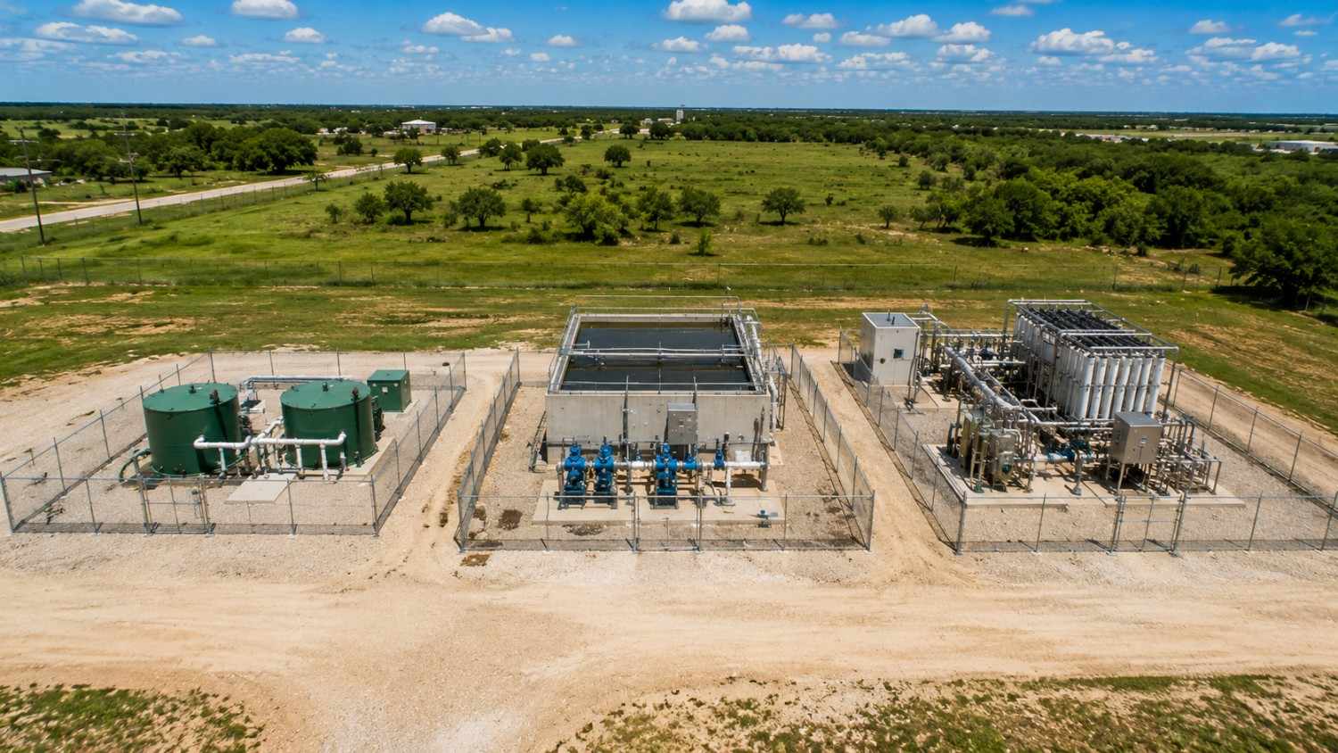 Side-by-side ground-level comparison of three Texas package wastewater treatment process configurations showing a simple extended aeration plant on the left a sequencing batch reactor in the center and a membrane bioreactor with visible membrane equipment on the right representing the treatment process selection analysis Modern Engineering Solutions performs matched to TCEQ permit requirements