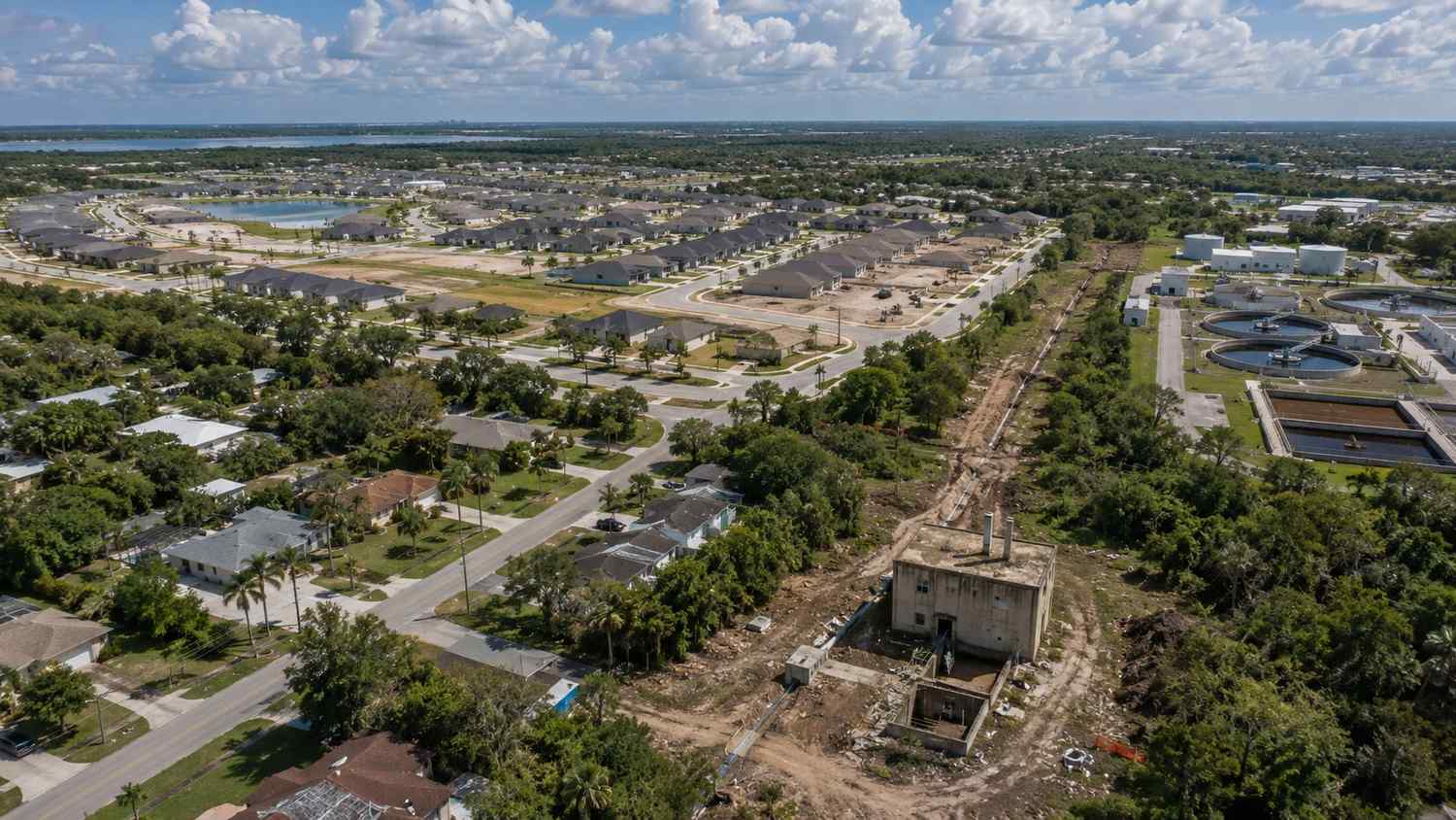 Aerial view of a Florida coastal community with aging wastewater infrastructure and rapid residential growth evaluated by MES.