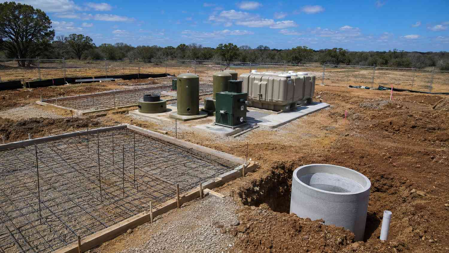 Private wastewater treatment plant under construction in Hays County Texas, representing MES TCEQ permit preparation.