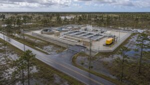 Aerial view of Houston area flooding surrounding water infrastructure, representing MES flood resilient design services.