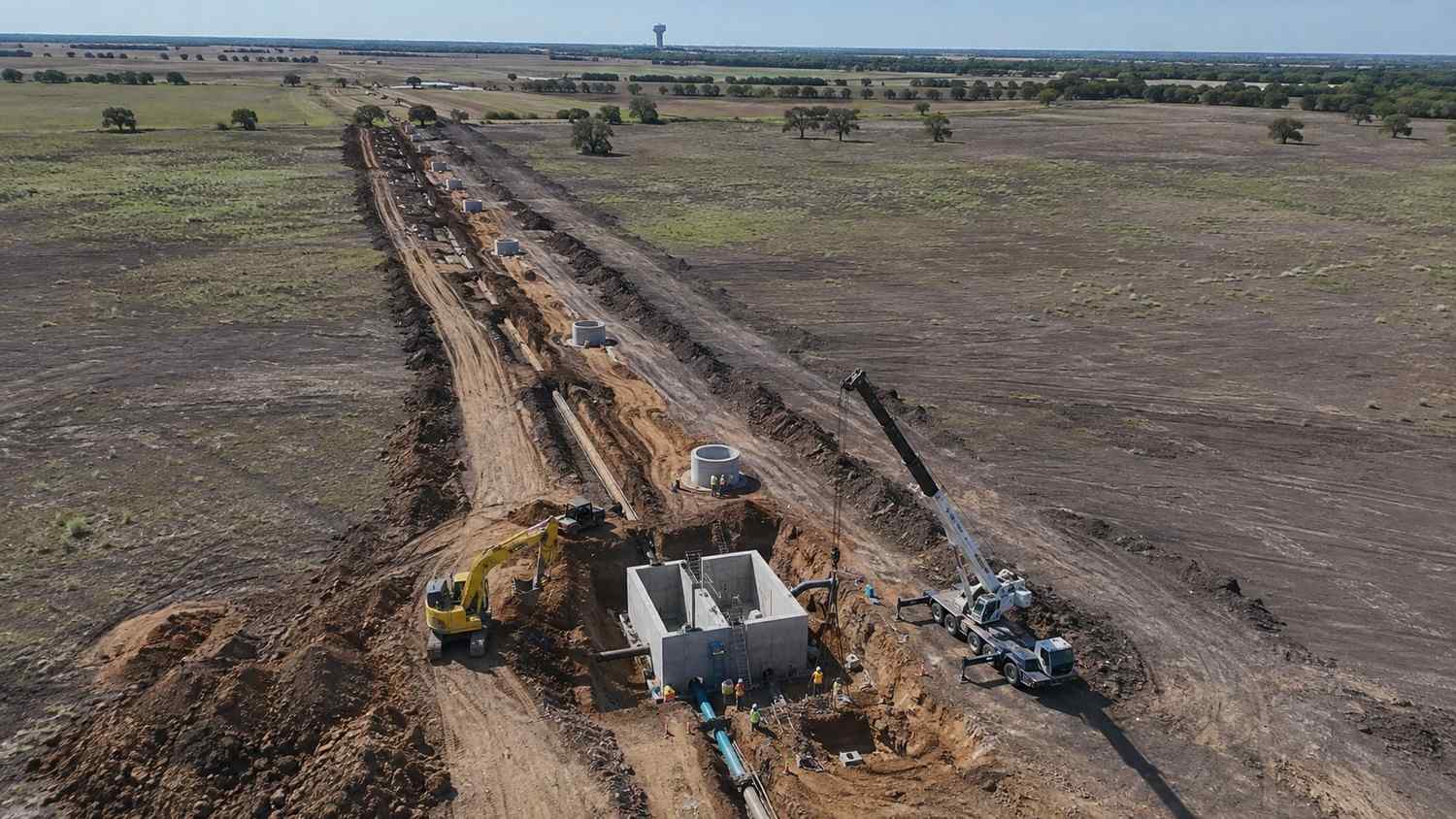 Sewer extension lift station and force main under construction for McKinney area development, representing MES extension cost evaluation.